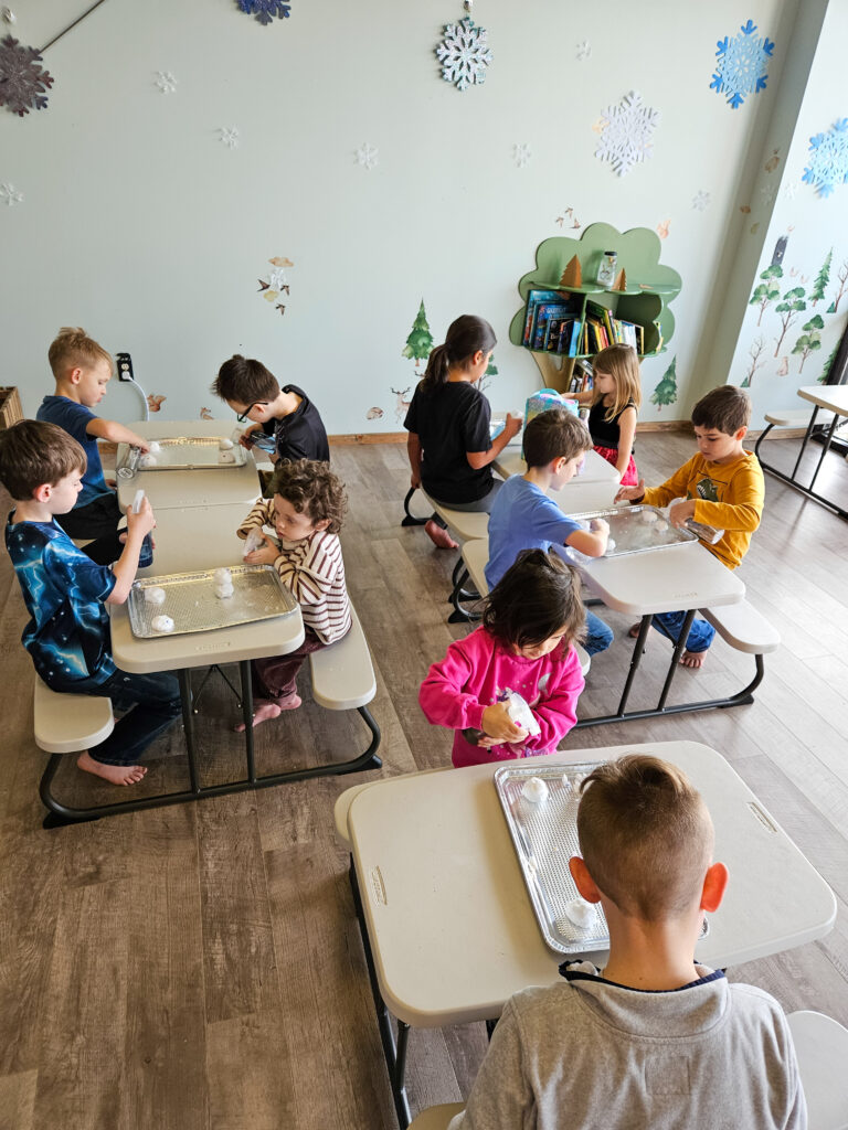 Our homeschool friends are working on a science experiment here at Adventure Gym.