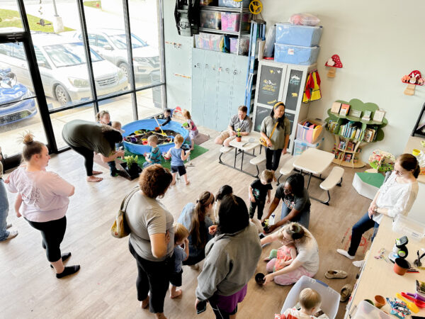 We invited another small Buisness for community story time and we planted flowers at Adventure Gym.